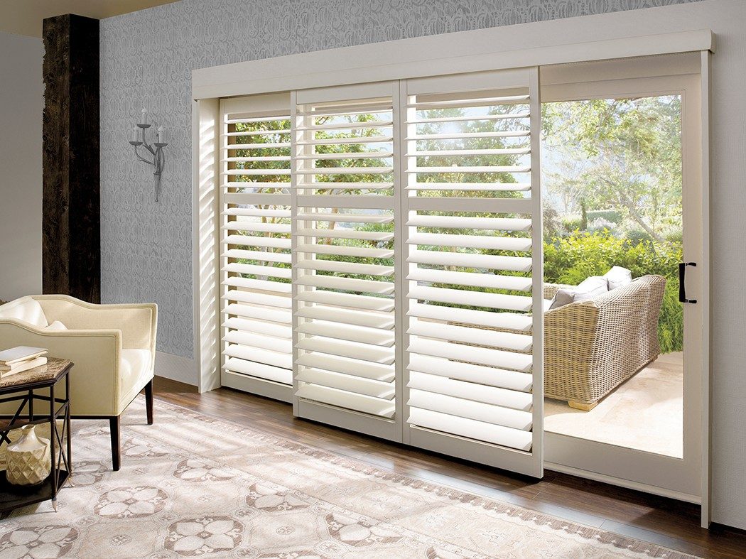 sliding interior shutters in front of ranchslider