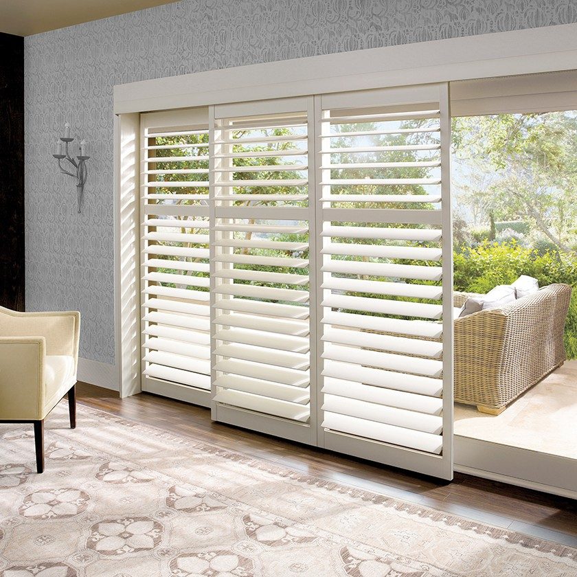 sliding interior shutters in front of ranchslider