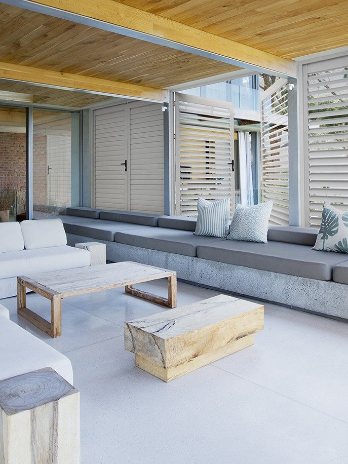 shutters in an enclosed outdoor area with door handles